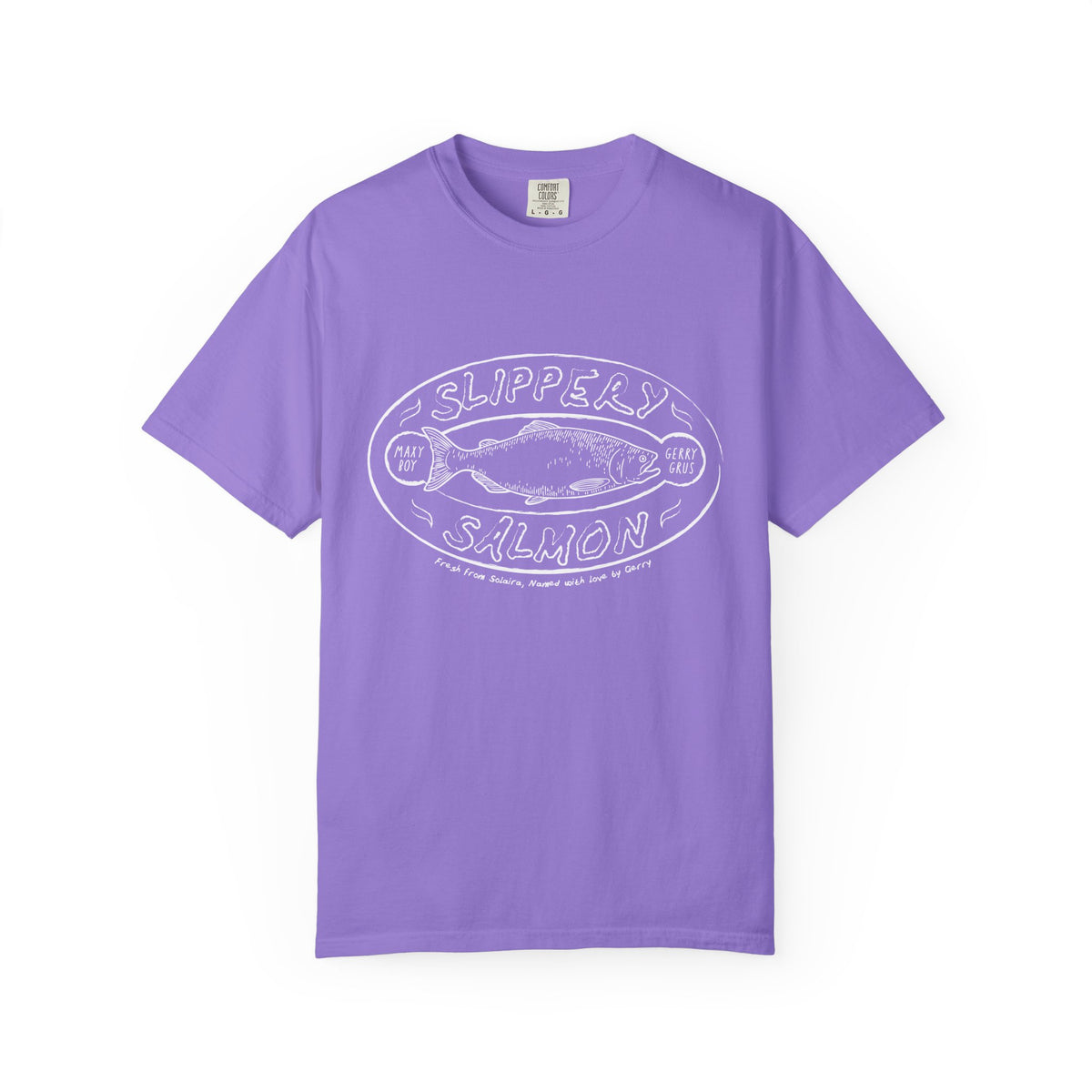 A vintage-wash Comfort Colors graphic tee by thtgrlreads from the Zodiac Academy collection, featuring a whimsical white “Slippery Salmon” print on a soft lavender base.