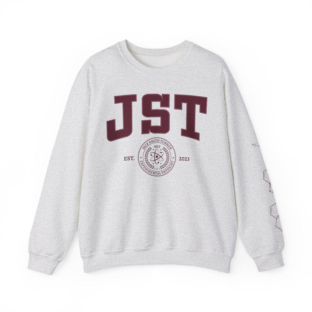 Light gray JST graphic crewneck sweatshirt with a collegiate crest and EST 2023 lettering, inspired by Ali Hazelwood, from Thtgrlreads Crewnecks collection