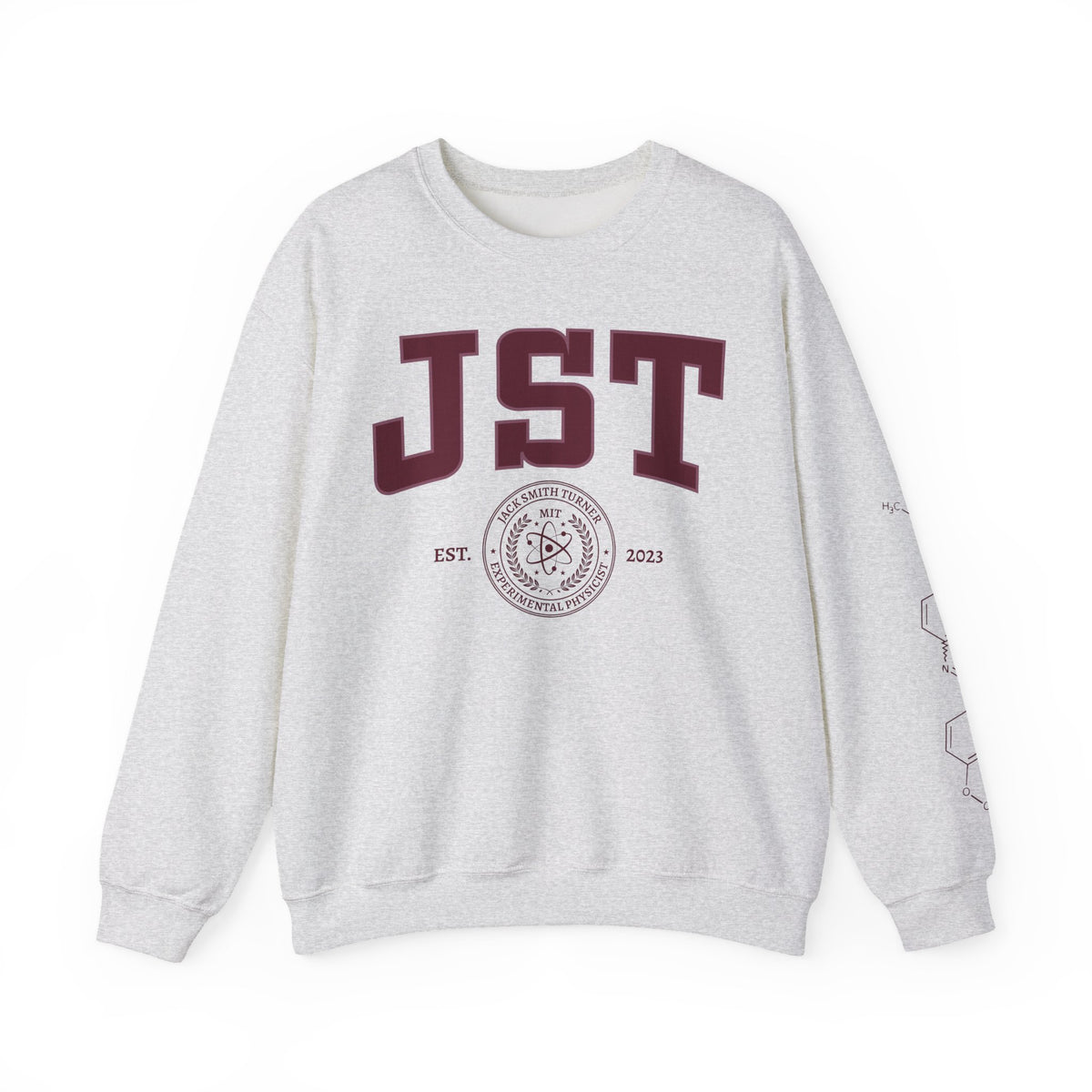 Light gray JST graphic crewneck sweatshirt with a collegiate crest and EST 2023 lettering, inspired by Ali Hazelwood, from Thtgrlreads Crewnecks collection