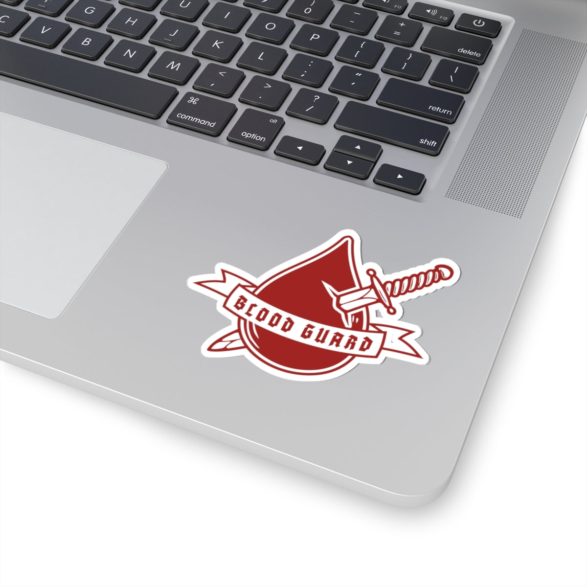 Sticker from the Bloodwing Academy collection by thtgrlreads featuring a red shield and sword design with "Blood Guard" text, ideal for bookish fans.
