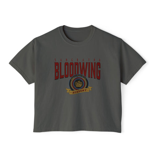 Bloodwing Academy crop top from thtgrlreads featuring a vintage wash Comfort Colors fabric with bold red gothic text and detailed emblem graphic, part of Bloodwing Academy and Tees collections.