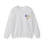 A vintage wash Comfort Colors crewneck sweatshirt by thtgrlreads featuring a small crossed hockey sticks graphic with numbers 24 and 81, part of the Hockey Romance collection.