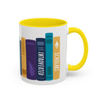 White ceramic mug with a bright yellow handle and interior, featuring a colorful book spine design labeled "Introverted Scholars," part of thtgrlreads bookish merchandise.