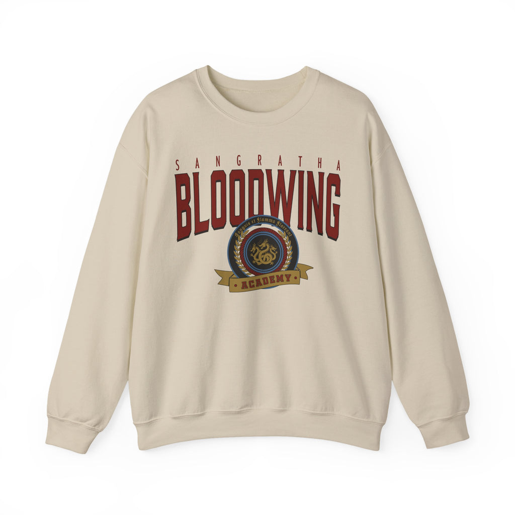 Thtgrlreads Bloodwing Academy crewneck sweatshirt featuring a vintage wash, Comfort Colors base with a bold printed crest graphic, part of officially licensed romantasy merch.