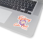 Sticker from thtgrlreads' Ruthless Boys of the Zodiac collection featuring a whimsical design with orange script text "Middle Kipling Cake Club" above a purple cake illustration, placed on a silver laptop.