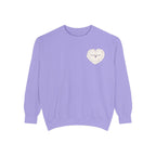 Thtgrlreads cozy Comfort Colors oversized crewneck in soft lavender from The Poison Daughter collection, featuring a delicate cream heart graphic with subtle text printing.