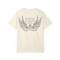 Liv Zander collection Comfort Colors graphic tee by thtgrlreads featuring vintage washed cream fabric with black detailed angel wings and poetic text printed on the back, part of Tees collection.