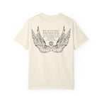 Liv Zander collection Comfort Colors graphic tee by thtgrlreads featuring vintage washed cream fabric with black detailed angel wings and poetic text printed on the back, part of Tees collection.