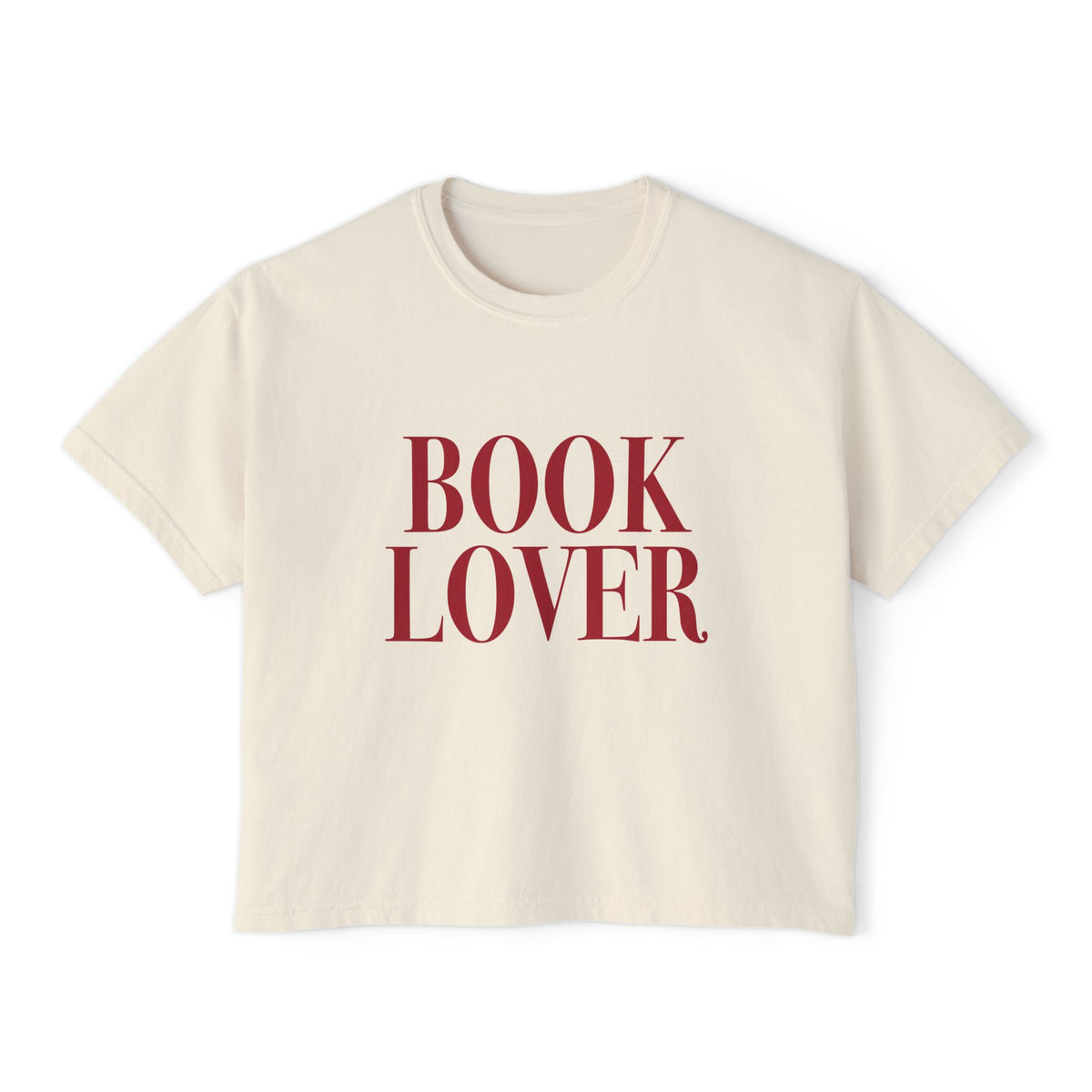 Thtgrlreads vintage-wash cream Comfort Colors cropped t-shirt from the Tees collection featuring bold red "BOOK LOVER" text in a classic serif font, perfect for bookish style.