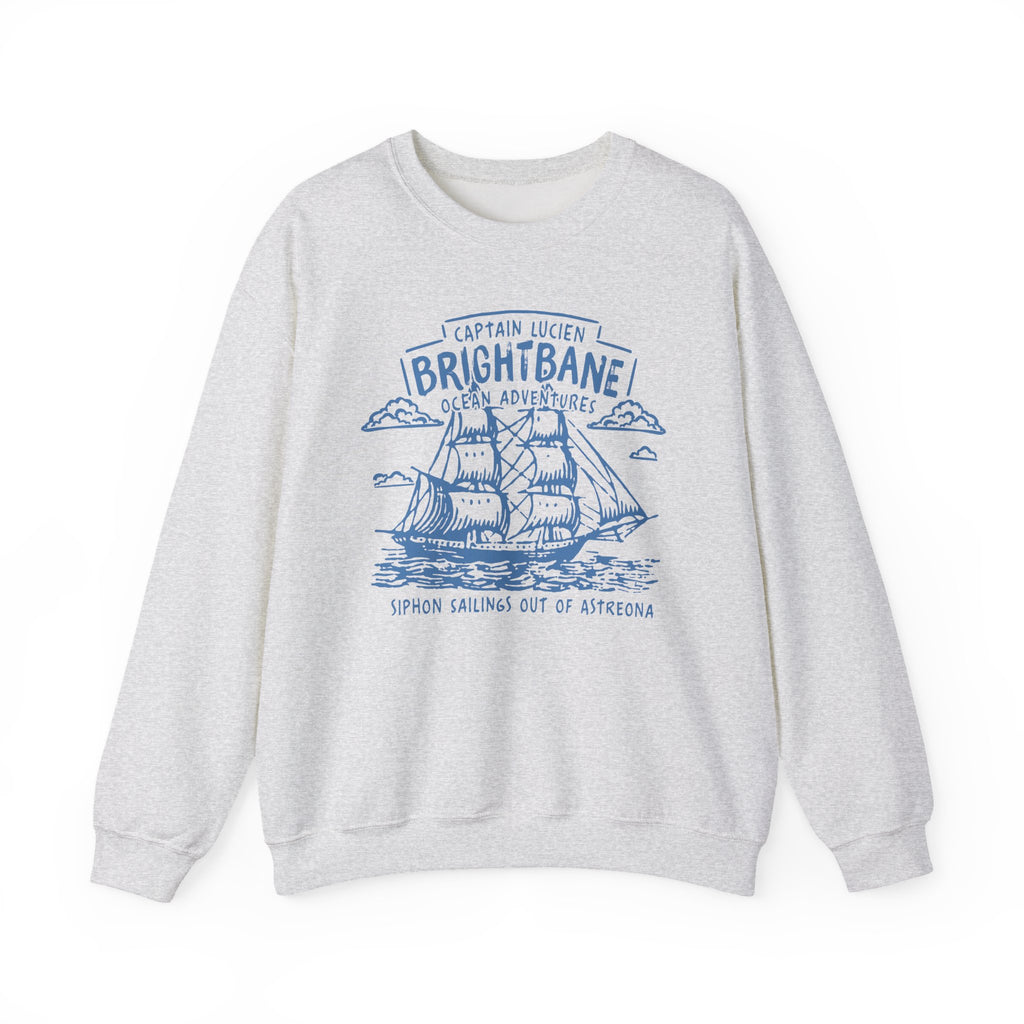 A vintage-wash Comfort Colors oversized crewneck from thtgrlreads featuring a blue nautical graphic inspired by Wolves of Ruin, part of the Printify Crewnecks collection.