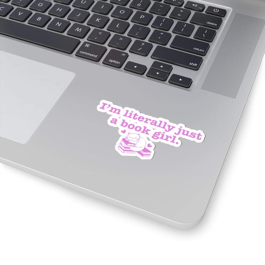 Sticker from thtgrlreads' Book Bestie collection featuring purple text saying "I'm literally just a book girl" above a cute illustration of a cat reading on stacked books.