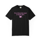 Black Comfort Colors graphic tee from thtgrlreads featuring vintage-wash cotton with a pink printed design that reads "I'm literally just a book girl" and a small heart-adorned book graphic, part of the Book Bestie and Tees collections.