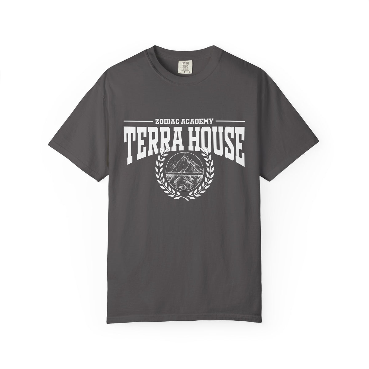 Unisex charcoal Comfort Colors graphic tee from Thtgrlreads featuring a vintage-style white print with "Zodiac Academy Terra House" text and mountain emblem, perfect for bookish fans.