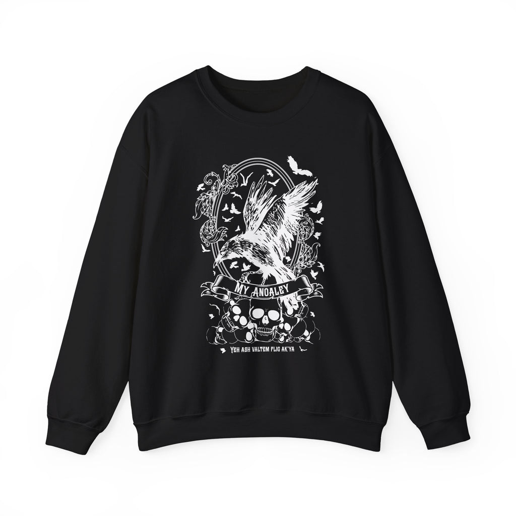 Black oversized crewneck sweatshirt from thtgrlreads Liv Zander collection featuring a vintage puff print graphic of a crow in flight surrounded by roses, skulls, and bats with gothic script text.