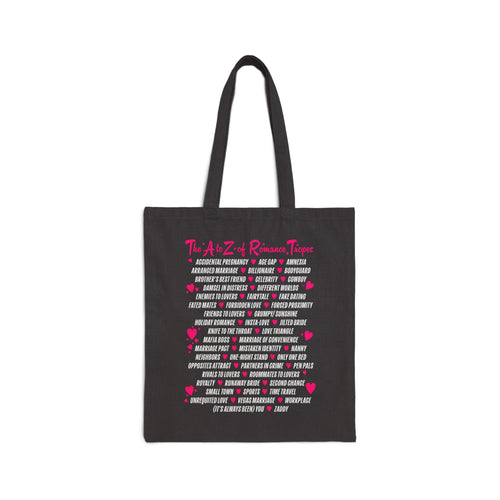Book Bestie collection tote bag by thtgrlreads featuring vintage-washed black fabric with bright pink and white romance trope text in a playful block print, perfect for romantasy fans.