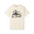 A vintage wash Comfort Colors graphic tee from thtgrlreads featuring a gothic design with laboratory glassware, a skull, and butterflies, inspired by Nocticadia themes.