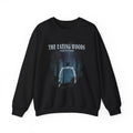 An officially licensed black oversized crewneck sweatshirt from thtgrlreads featuring The Eating Woods collection, with a vintage-style forest graphic and text print on Comfort Colors fabric.