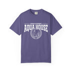 Zodiac Academy-themed Comfort Colors graphic tee by thtgrlreads featuring a vintage wash purple base with white "Aqua House" text and a wave emblem, perfect for Back to School fans.