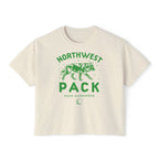 Cream cropped graphic tee with green Northwest Pack wolf artwork and Koen Alexander text, a vintage wash design from Thtgrlreads Ali Hazelwood collection