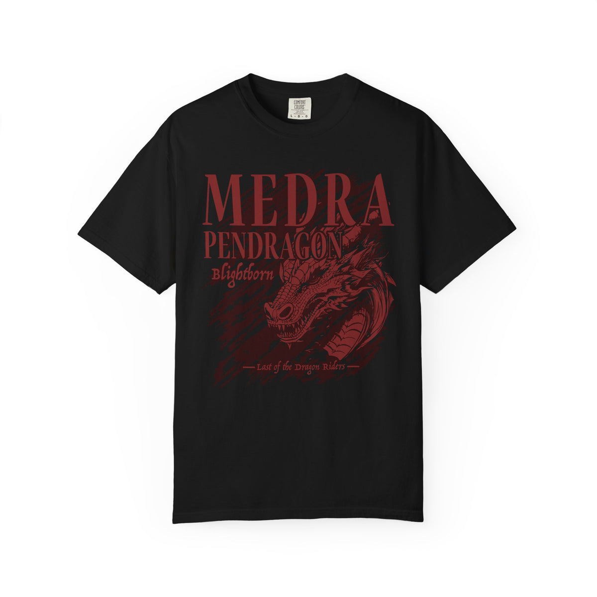 A black Comfort Colors graphic tee from thtgrlreads featuring a vintage wash and a dark red vintage puff print graphic of a dragon head with the text "Medra Pendragon Blightborn" and "Last of the dragon riders.