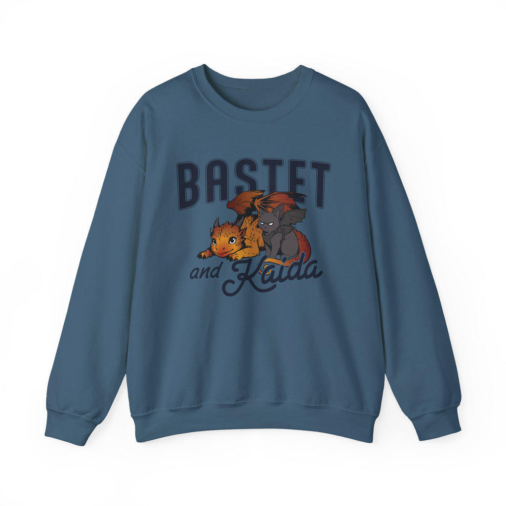 thtgrlreads Blood Bound crewneck sweatshirt featuring orange and gray dragons with Bastet and Kaida lettering on a blue vintage style graphic, printed by Printify