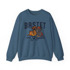 thtgrlreads Blood Bound crewneck sweatshirt featuring orange and gray dragons with Bastet and Kaida lettering on a blue vintage style graphic, printed by Printify