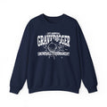 A navy oversized crewneck from thtgrlreads featuring Liv Zander collection text and a white vintage-style graphic reading “1st Annual Gravedigger Snowball Tournament” with a snowball splash design.