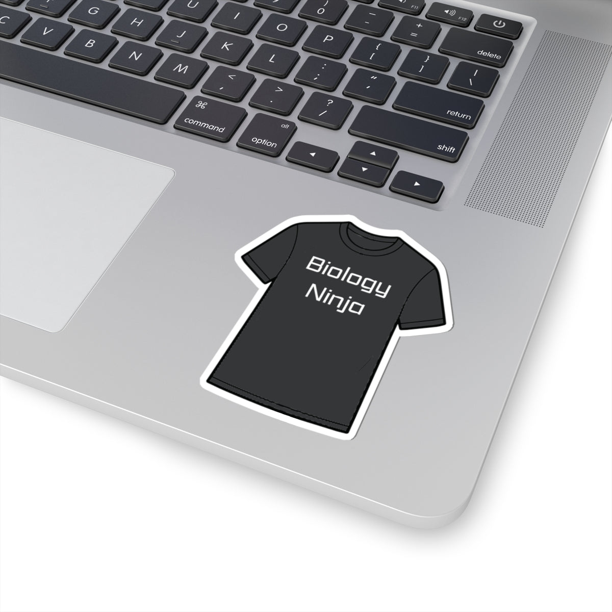 Black kiss cut vinyl sticker showing a Biology Ninja T-shirt design on a laptop, from Thtgrlreads and inspired by Ali Hazelwood’s The Love Hypothesis