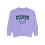 Zodiac Academy Aqua House crewneck sweatshirt from thtgrlreads features a vintage-washed Comfort Colors base with bold dark teal graphic text and emblem, perfect for cozy back-to-school wear.