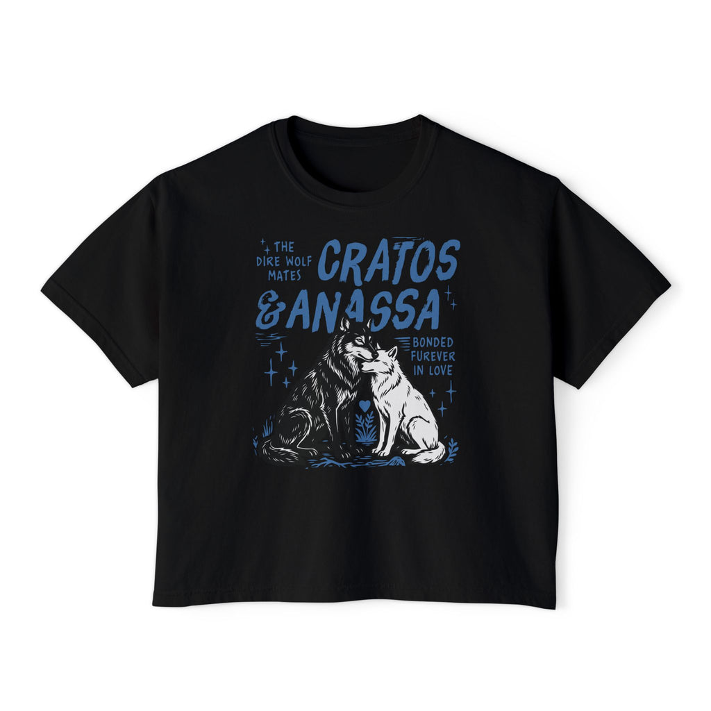 Wolves of Ruin collection from thtgrlreads features a vintage-wash black Comfort Colors crop top with a blue graphic of Cratos and Anassa wolves and romantic text, Printify.