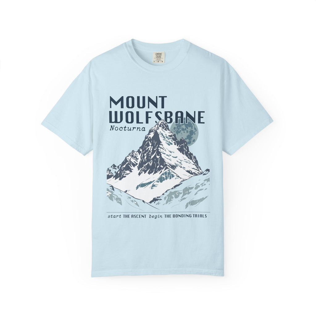 Thtgrlreads comfort colors graphic tee from the Wolves of Ruin collection featuring a vintage wash light blue fabric with a bold mountain print and stylized text referencing Mount Wolfsbane.