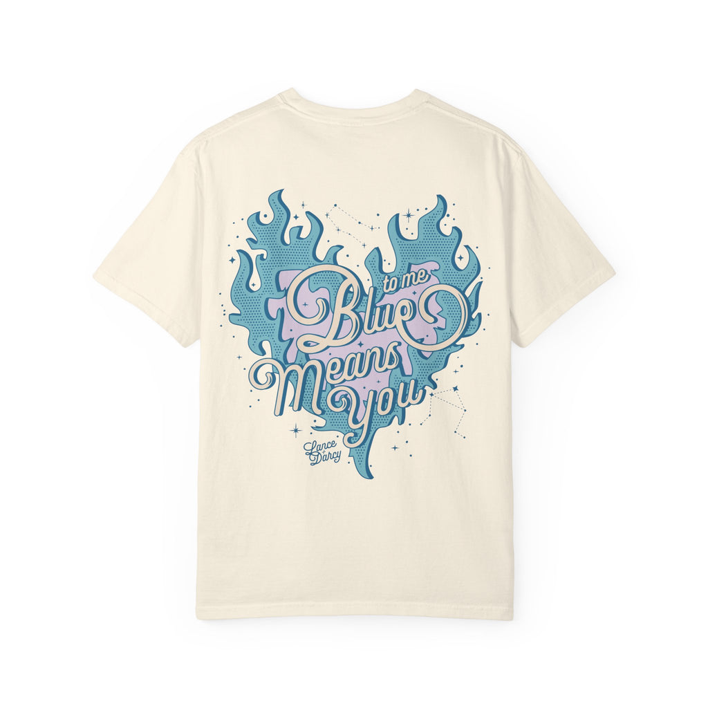 Thtgrlreads Zodiac Academy collection comfort colors graphic tee featuring a vintage wash cream base with a blue flame heart and pastel pink and blue "Blue means you" script design.