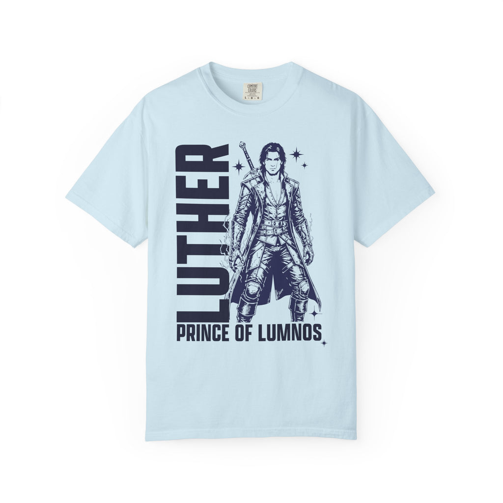 Kindred's Curse Saga tee by thtgrlreads featuring a vintage wash Comfort Colors graphic tee in light blue with bold black print of a fantasy character and text "Luther Prince of Lumnos," part of official licensed bookish apparel collections.