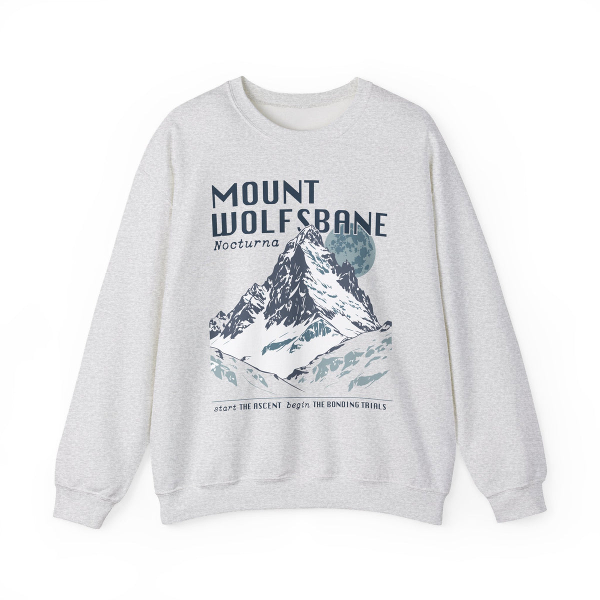 Thtgrlreads Wolves of Ruin collection vintage-wash Comfort Colors crewneck sweatshirt featuring a bold Mount Wolfsbane mountain graphic with moonlit night theme and stylized text.