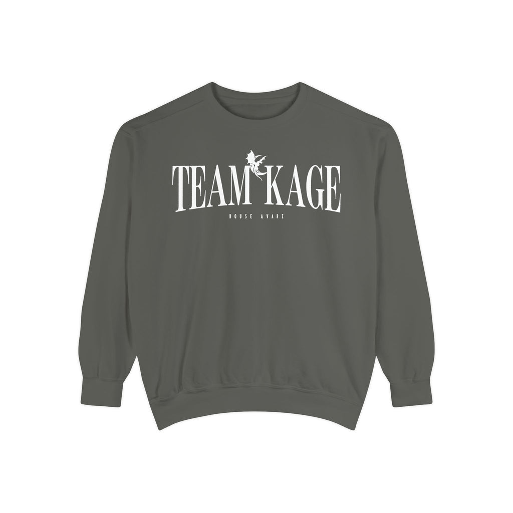 Bloodwing Academy crewneck sweatshirt from thtgrlreads featuring a vintage-wash, soft gray Comfort Colors fabric with bold white "TEAM KAGE" text and a small graphic print.