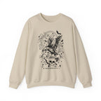 Thtgrlreads Liv Zander collection oversized crewneck sweatshirt in vintage-washed cream Comfort Colors fabric featuring a detailed black gothic print with a raven, skulls, and banner design.