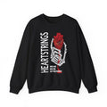 thtgrlreads Liv Zander collection oversized crewneck sweatshirt featuring a vintage-washed Comfort Colors base with a bold graphic of a skeletal hand holding a red anatomical heart and stylized text reading "HEARTSTRINGS" in white vertical letters.