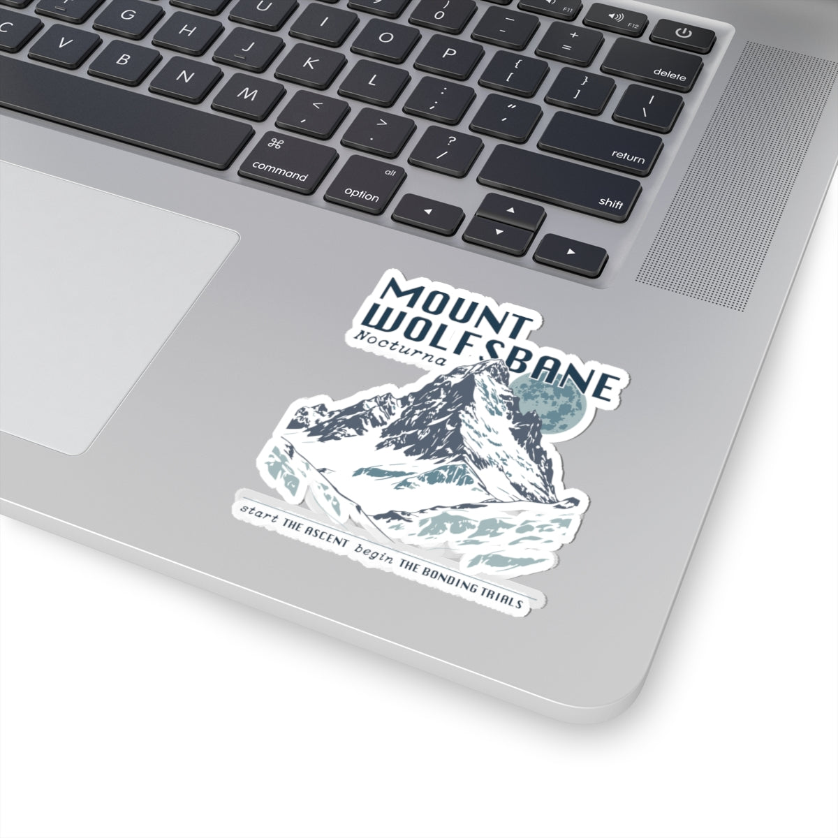 Sticker from thtgrlreads featuring Wolves of Ruin collection art with a detailed mountaintop design and stylized text, perfect for laptops or bookish fans.