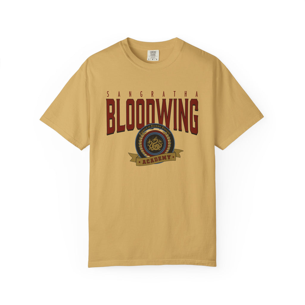 Thtgrlreads Bloodwing Academy collection featuring a vintage wash Comfort Colors graphic tee in muted gold with bold maroon text and a circular emblem, perfect for Back to School fans.