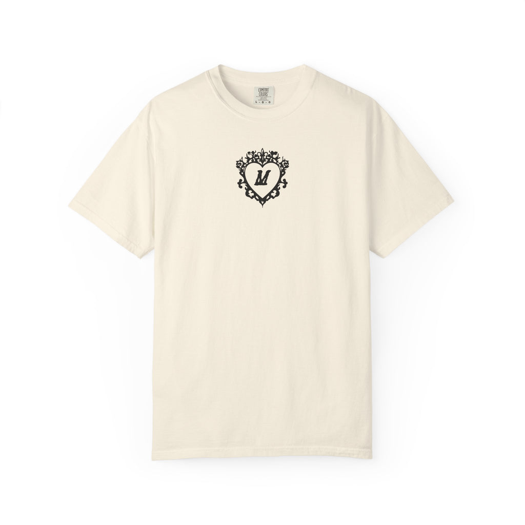 Liv Zander collection Comfort Colors graphic tee from thtgrlreads featuring a vintage wash cream fabric and a black ornate heart with the letter M printed on the chest.