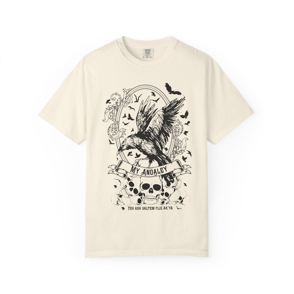 A vintage-wash comfort colors graphic tee from thtgrlreads featuring Liv Zander-inspired fantasy artwork with a detailed black crow, skulls, and gothic script, part of the Liv Zander and Tees collections.