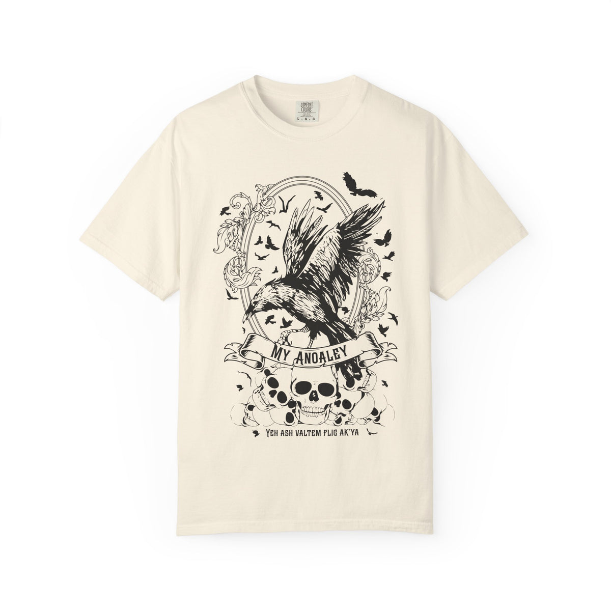 A vintage-wash comfort colors graphic tee from thtgrlreads featuring Liv Zander-inspired fantasy artwork with a detailed black crow, skulls, and gothic script, part of the Liv Zander and Tees collections.