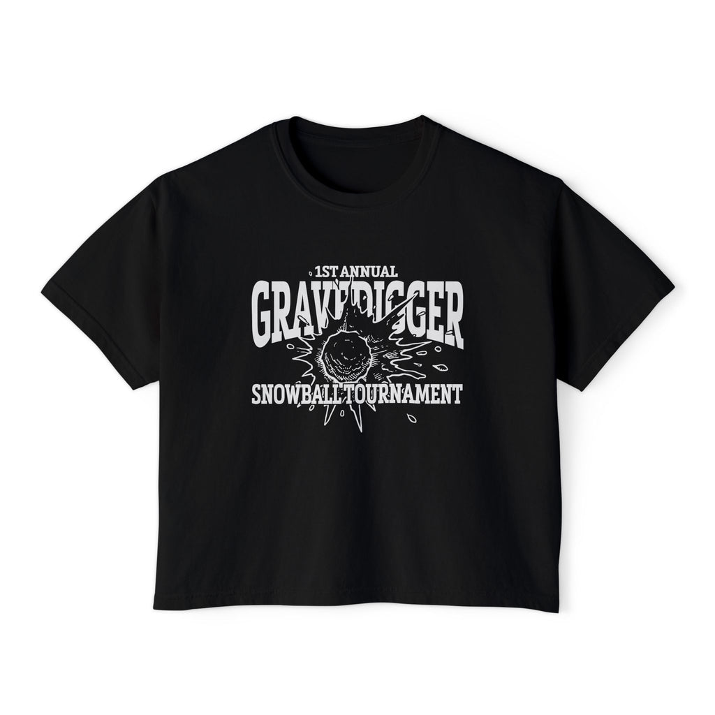 A black vintage-wash Comfort Colors crop top from thtgrlreads featuring a bold white graphic with "1st Annual Gravedigger Snowball Tournament" text and a snowball design, part of the Liv Zander collection.