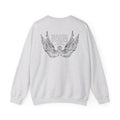 Liv Zander collection oversized crewneck from thtgrlreads featuring vintage-wash light gray Comfort Colors fabric and a detailed black wing graphic with poetic text on the back.