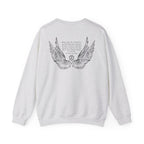 Liv Zander collection oversized crewneck from thtgrlreads featuring vintage-wash light gray Comfort Colors fabric and a detailed black wing graphic with poetic text on the back.