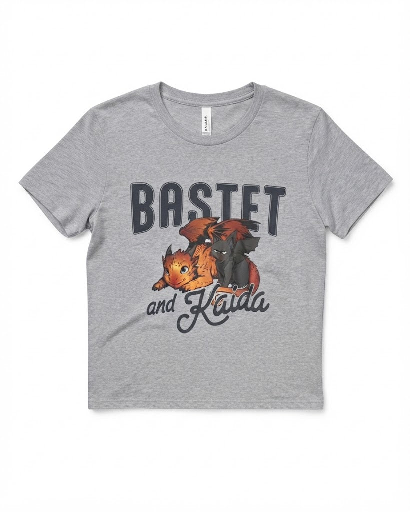 Gray Bastet and Kaida baby tee with illustrated orange and charcoal dragons and bold lettering, a licensed Blood Bound design from Printify in the Tees collection