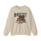 thtgrlreads Blood Bound oversized crewneck sweatshirt featuring colorful Bastet and Kaida dragons with bold vintage inspired lettering and a bookish fantasy design