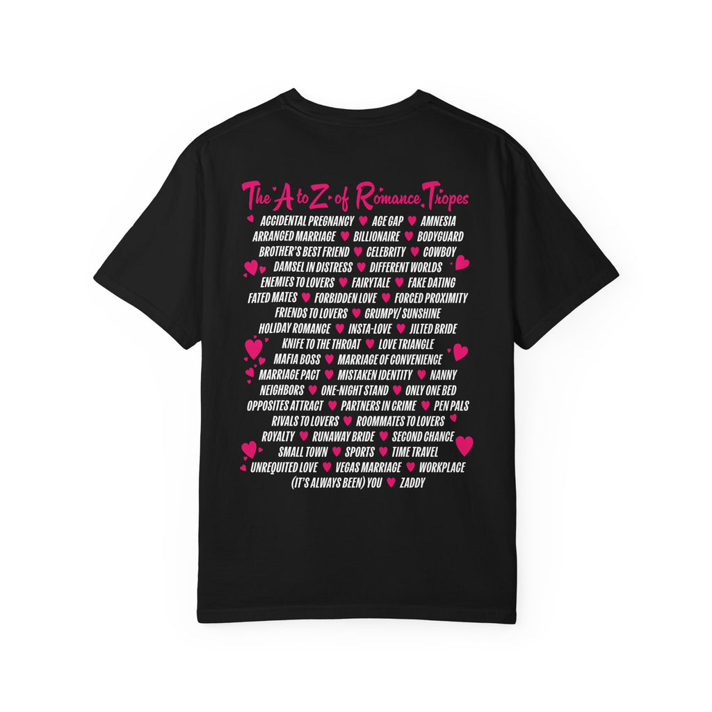 Romantasy-themed black Comfort Colors graphic tee by thtgrlreads, featuring a vintage wash and bold pink and white print listing romance tropes, from the Book Bestie collection.