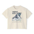 thtgrlreads Wolves of Ruin collection crop top featuring a vintage-wash Comfort Colors fabric with a graphic print of a snowy mountain scene and bold "Mount Wolfsbane" text.