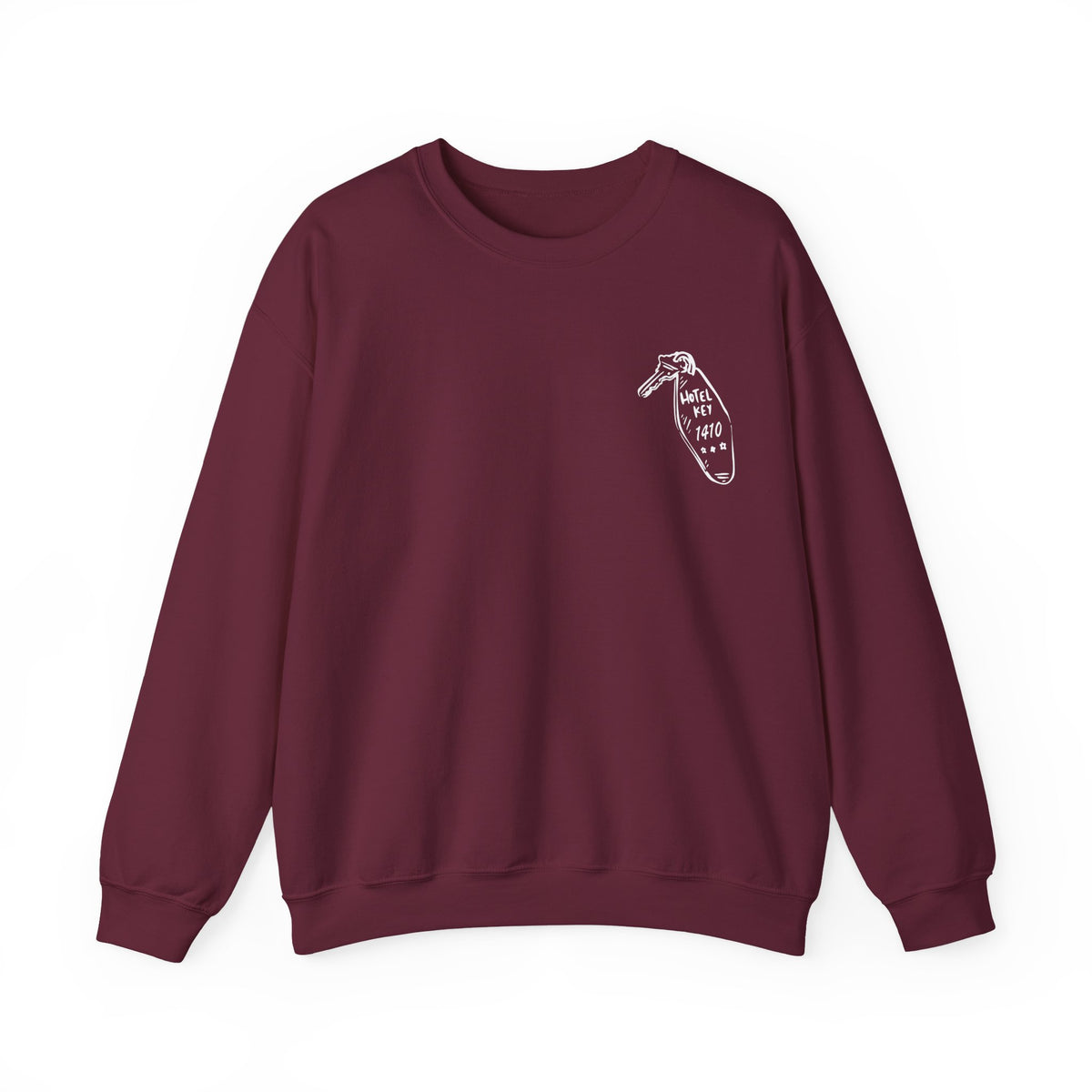 Thtgrlreads oversized crewneck sweatshirt from the Hockey Romance collection featuring a vintage wash Comfort Colors base in deep burgundy with a small minimalist graphic on the chest and relaxed unisex fit.